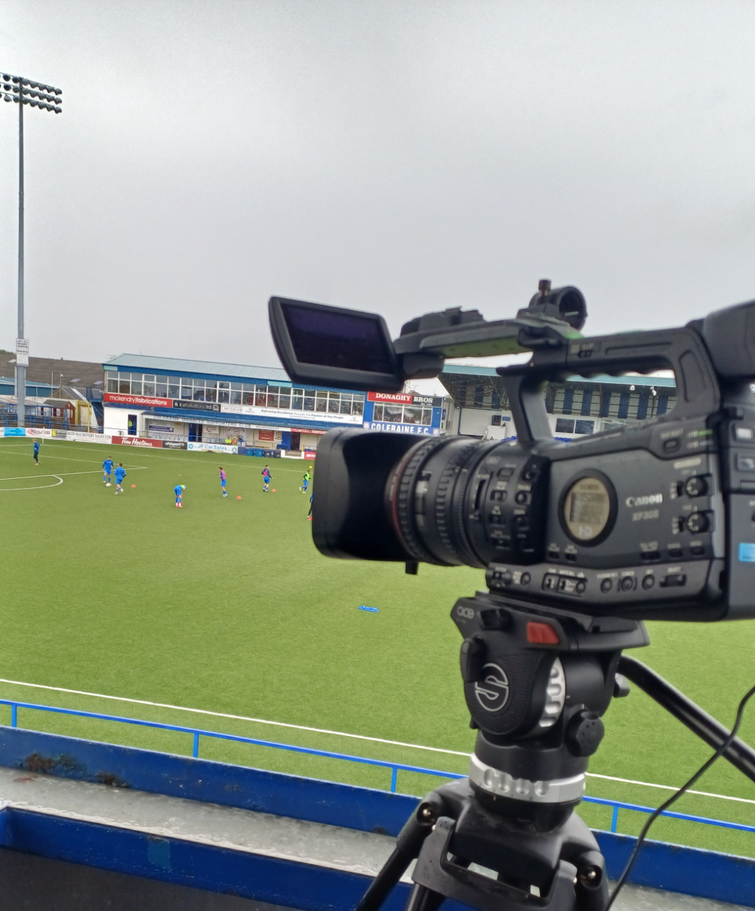 A professional video camera capturing football at Coleraine Showgrounds